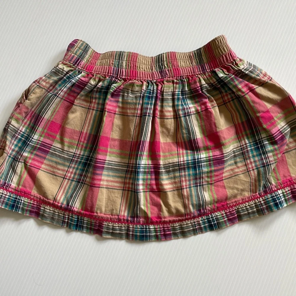 Cherokee tan, pink & blue plaid skirt.  Girls size small 6 - 6x